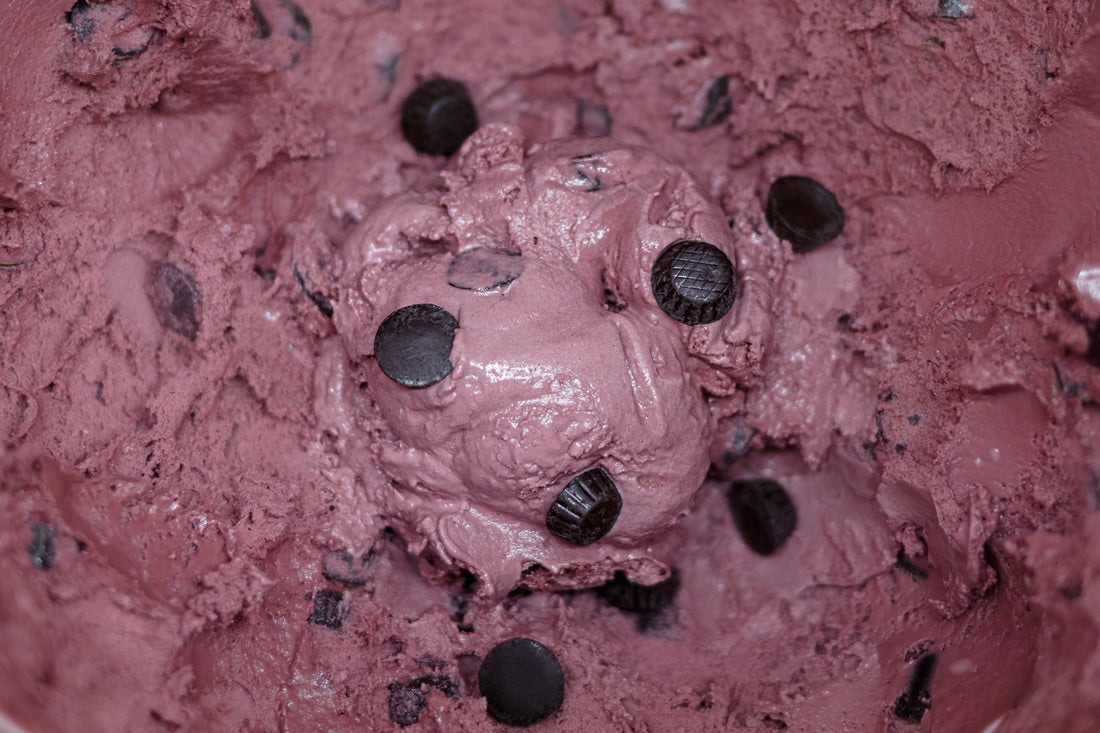 Black raspberry truffle ice cream with swirls of raspberry and chocolate