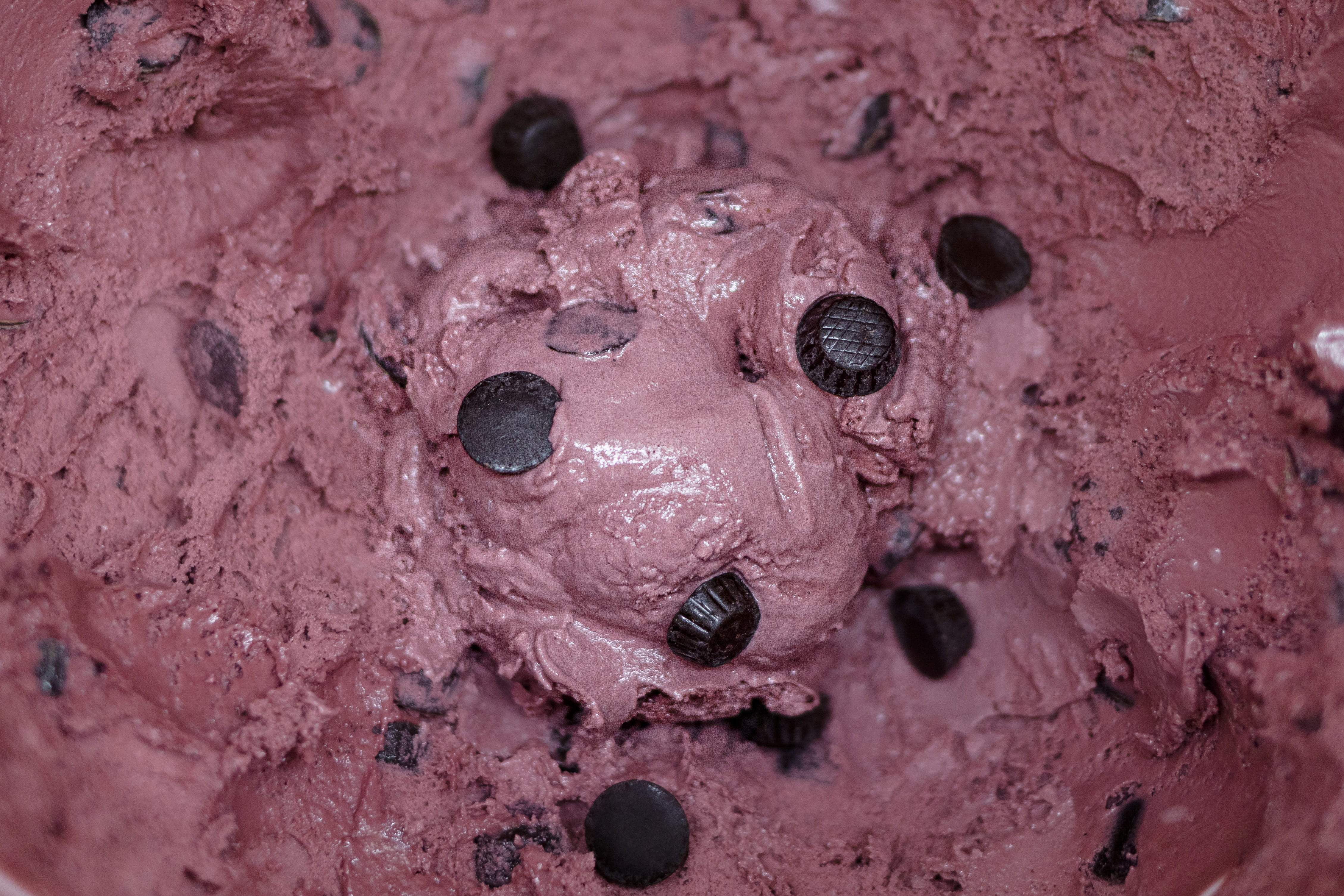 Black raspberry truffle ice cream with swirls of raspberry and chocolate