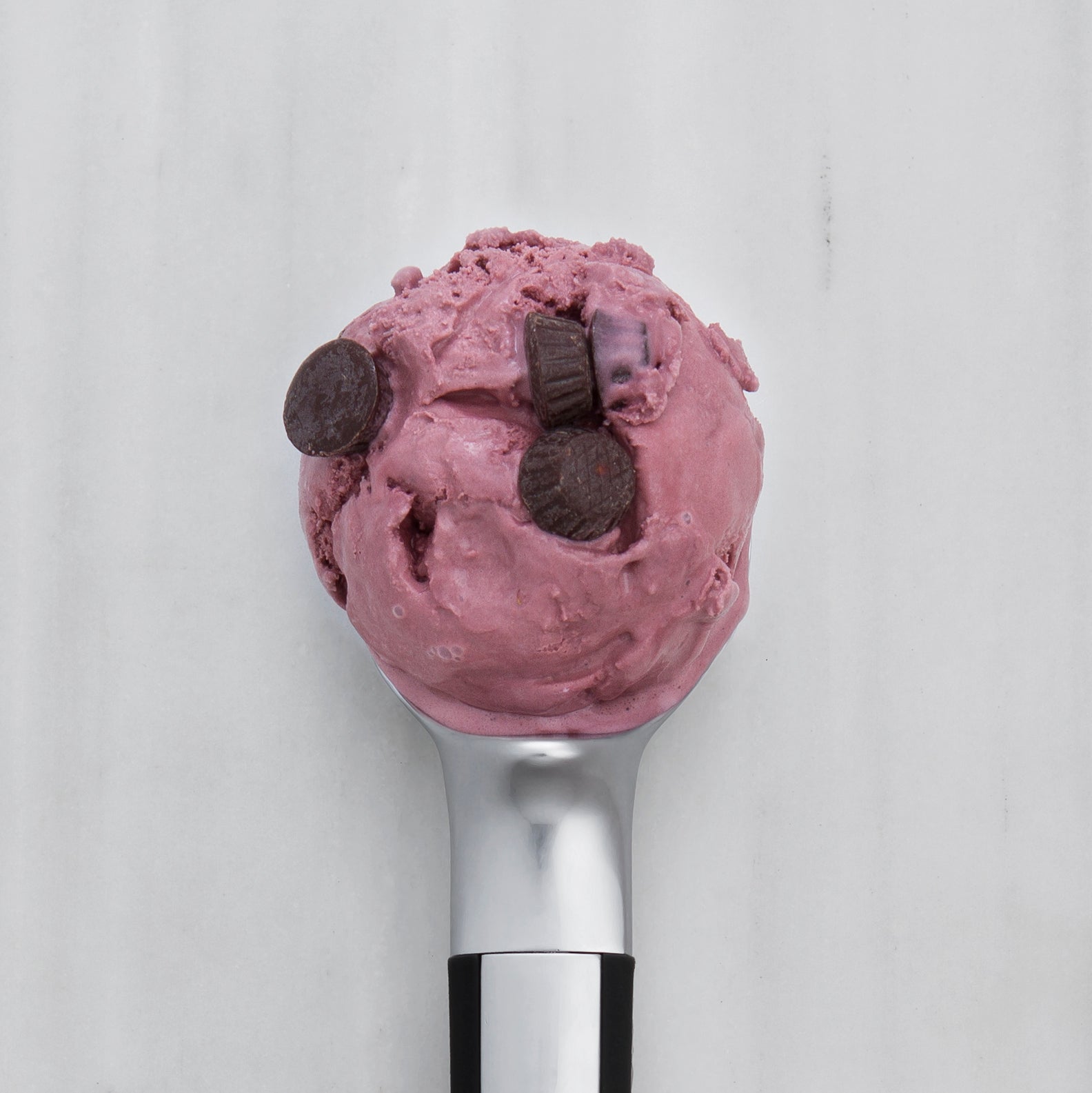 Black Raspberry Truffle ice cream scoop with chocolate chips 