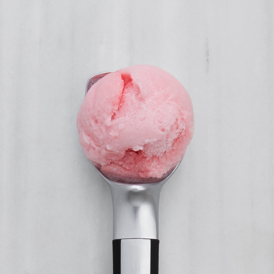 Pink lemonade sorbet, a refreshing frozen treat